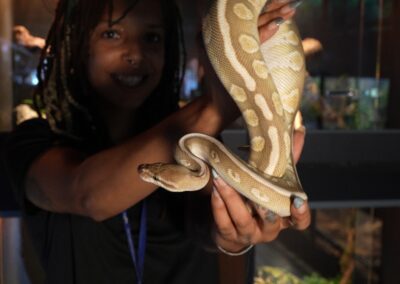 girl holding snake